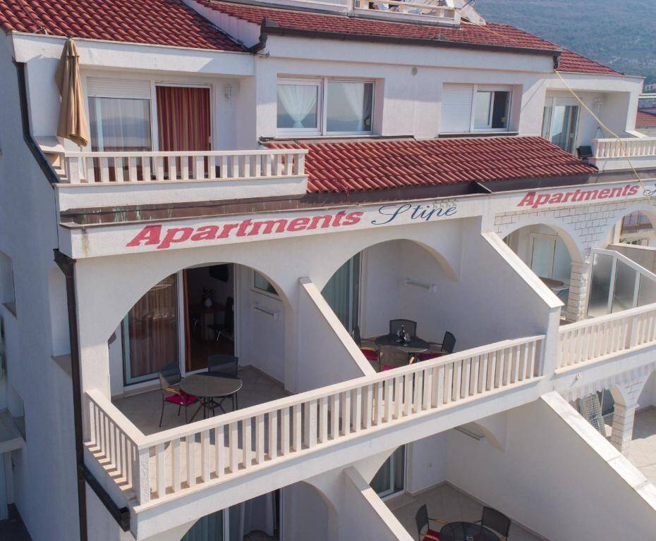 Balconies of Stipe Residence with outdoor furniture